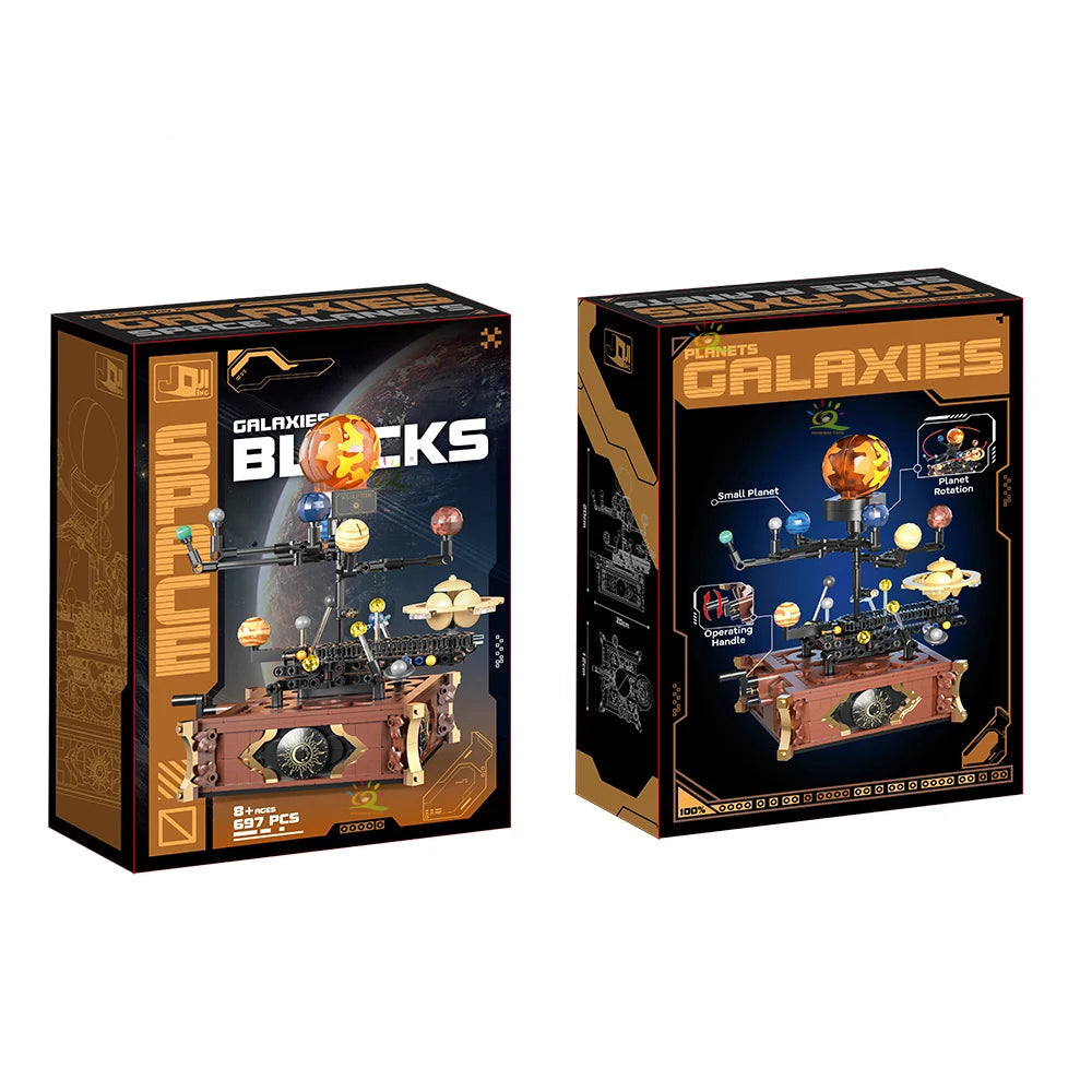 Box packaging of the 697PCS mechanical solar system building set — Galaxies Blocks model displayed front and side.