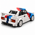 Velocity Edge 355-piece sports car, rear three-quarter studio angle on white