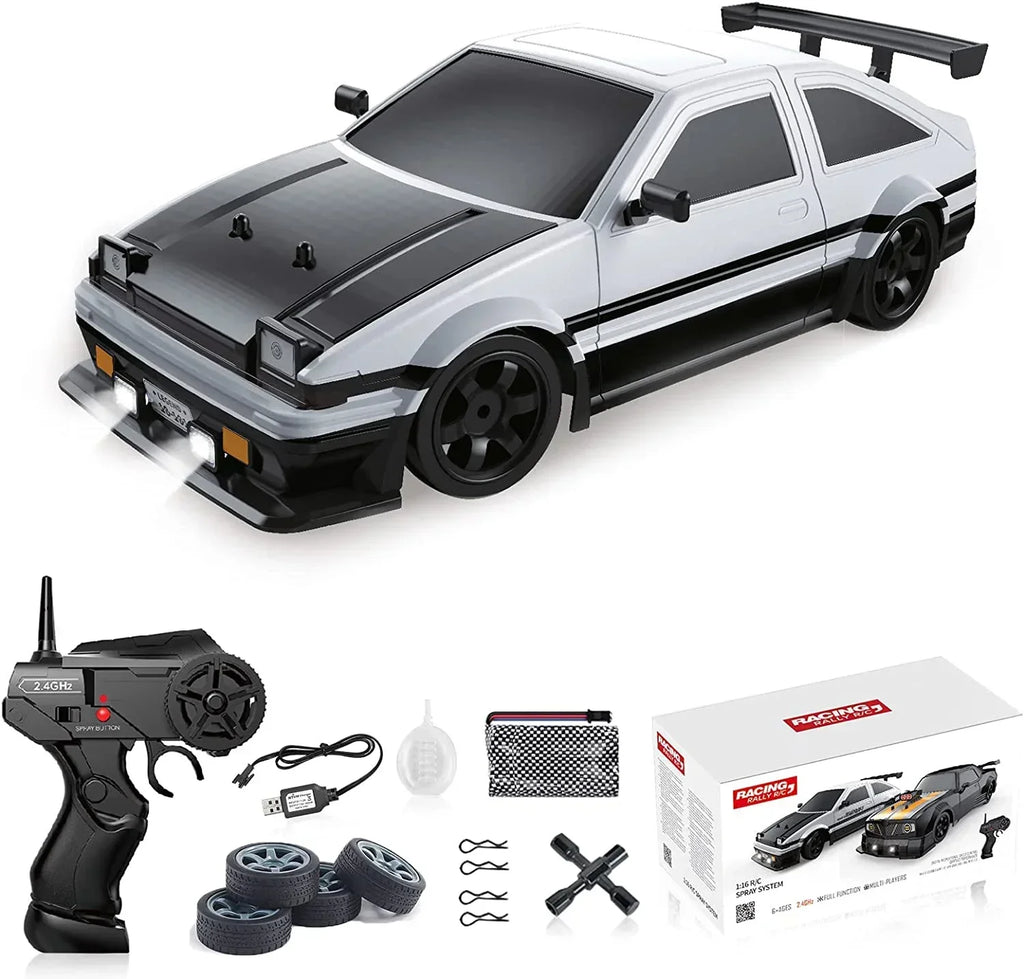 Model car kit with remote control, wheels, and accessories on a white background