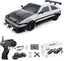Model car kit with remote control, wheels, and accessories on a white background