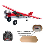 Red toy airplane with propeller and remote control, showing packaging details.