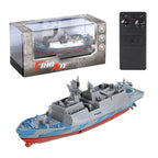 Toy warship with remote control and packaging on a white background