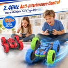 Ergonomic 2.4GHz handheld remote controller displayed beside the compact aqua stunt racer.