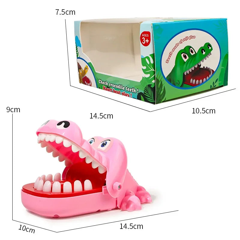 Pink bite finger crocodile game toy with packaging and size measurements shown