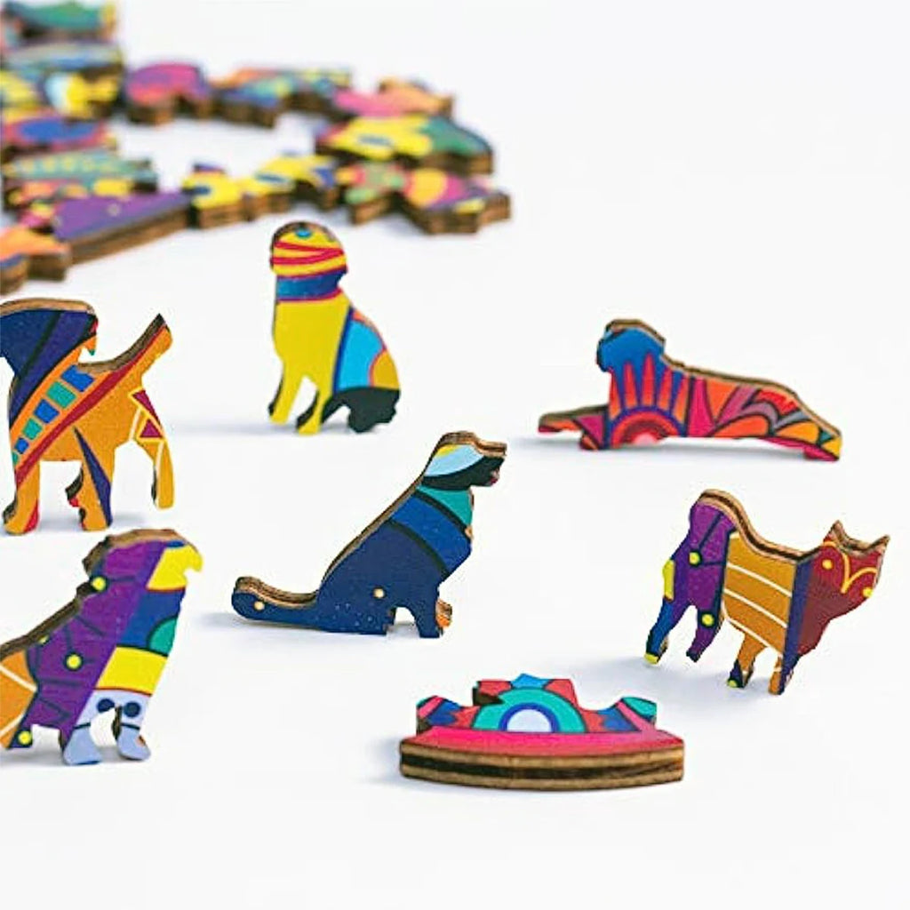 Animal-shaped wooden jigsaw puzzle pieces from blue owl puzzle set close-up detail