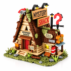 Front-left three-quarter studio view of the Mystery Cabin building block model on white.