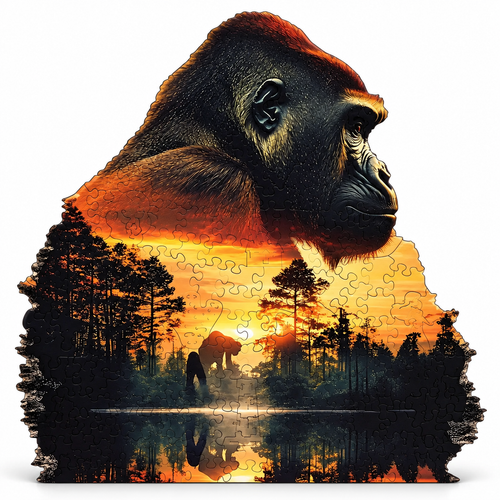 Completed orangutan-shaped wooden jigsaw puzzle showing an orangutan above a sunset forest, centered on white