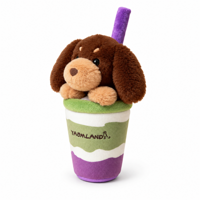Chew-resistant plush dog toy in cup, left-facing three-quarter studio product image