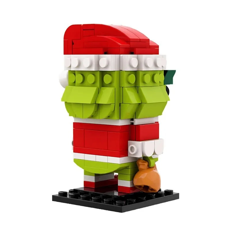 Back view of Christmas Green Monster MOC building blocks figure on display base, LEGO-compatible DIY holiday model by Toylvia