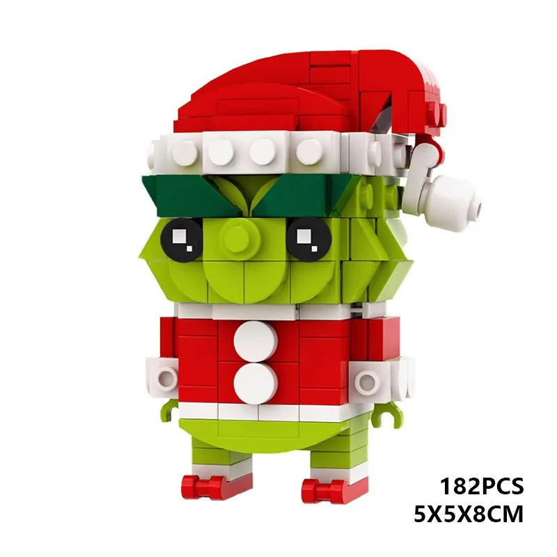 Front view of Christmas Green Monster MOC building blocks with Santa hat, 184-piece DIY model made from interlocking bricks by Toylvia