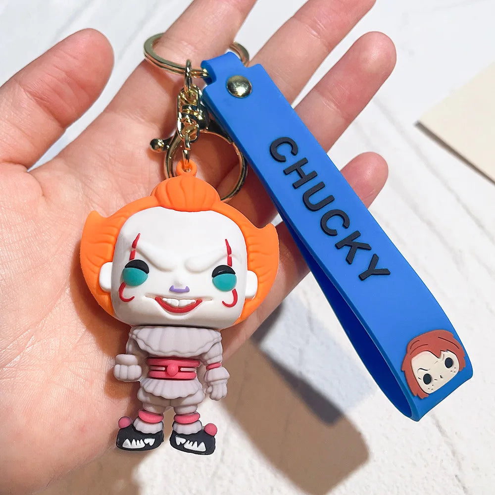 Chucky-style horror doll keychain with clown-inspired design and blue wrist strap