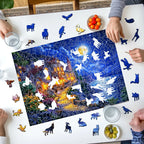 People working on a puzzle with a castle design on a table.