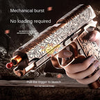 Decorative gun with intricate designs held by a hand, against a dark background.