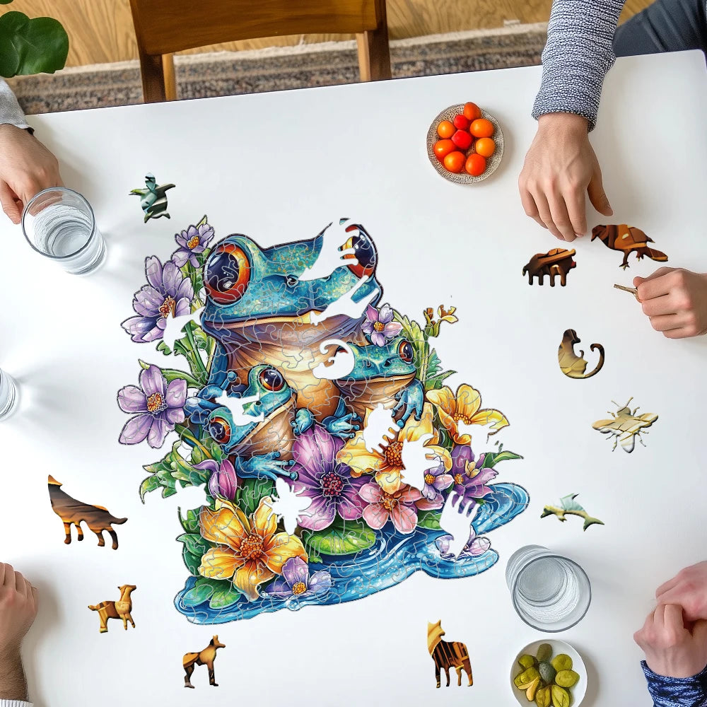 Children playing with a puzzle of a colorful frog and flowers on a table.