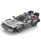 Toy model of a car resembling the DeLorean from Back to the Future made from interlocking bricks on a white background.