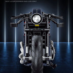 Black motorcycle model on a dark background with spotlight effect