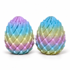 2pcs rainbow dragon egg fidget toy set of 2, centered on white with natural contact shadows