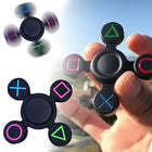 Macro action photograph of the fidget spinner rotating at high speed showing a smooth rotational blur.