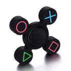 The fidget spinner balancing upright as a gyroscopic desk top spinning smoothly on a wooden surface.