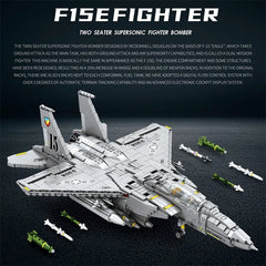 Close-up detail of F-15E Strike Eagle building blocks showing intricate cockpit design, detailed fuselage sections, dual engines, missile attachment points, weapons systems assembly, and precision building block construction
