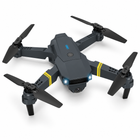 Elevated rear three-quarter view of the folding RC quadcopter showing all four arms and propellers