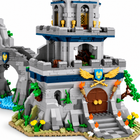 Macro detail of the Azure Throne fortress building-block model's gray stone gate, navy accents and gold crest on white