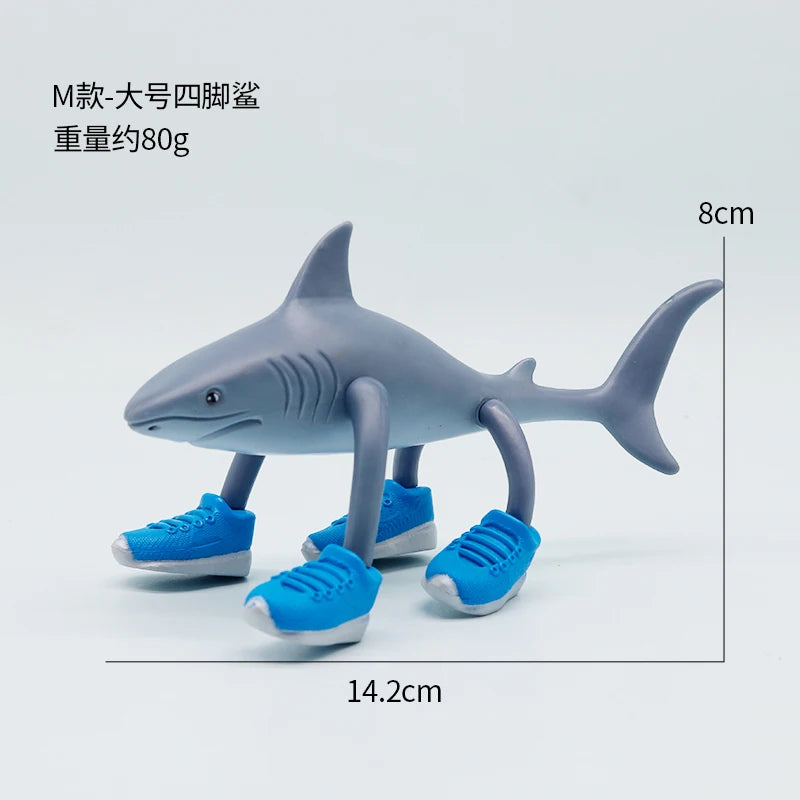 Funny four-leg shark toy figure wearing blue shoes, creative desk collectible on white background – Toylvia