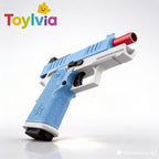 Low-angle view looking up at the red barrel of the blue G17/2011 soft bullet blaster.