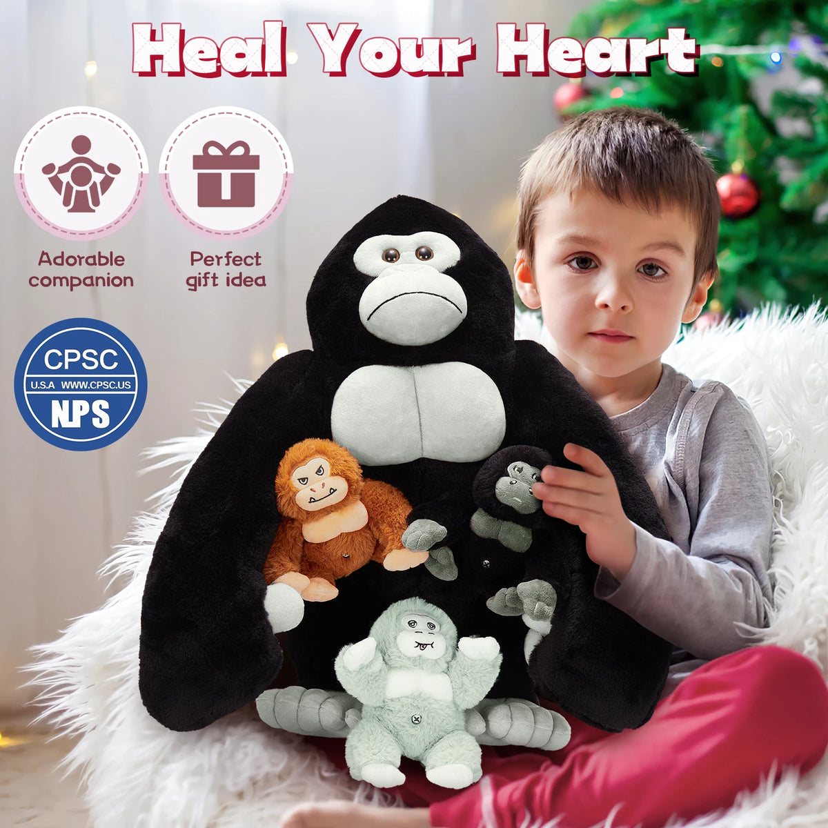 Child holding a plush gorilla with smaller gorilla toys, surrounded by Christmas decorations.