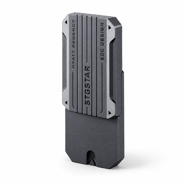 Metal EDC push slider fidget in gray standing upright on white