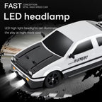 Model car with LED headlights on a dark background