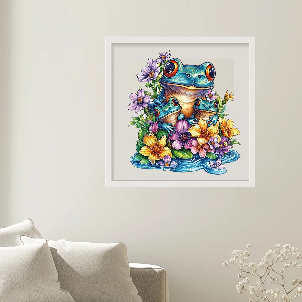 Framed artwork of a colorful frog surrounded by flowers on a wall.