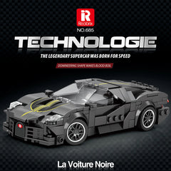 Complete La Voiture Noire luxury supercar building set with 339 precision building blocks displayed in black and gold colors, featuring sleek aerodynamic racing design, detailed mechanical components, and premium construction quality

