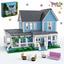Toy house set with blue exterior and white porch, featuring furniture and garden elements, on a white background.