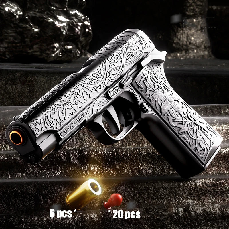 Decorative handgun with intricate patterns on a dark surface