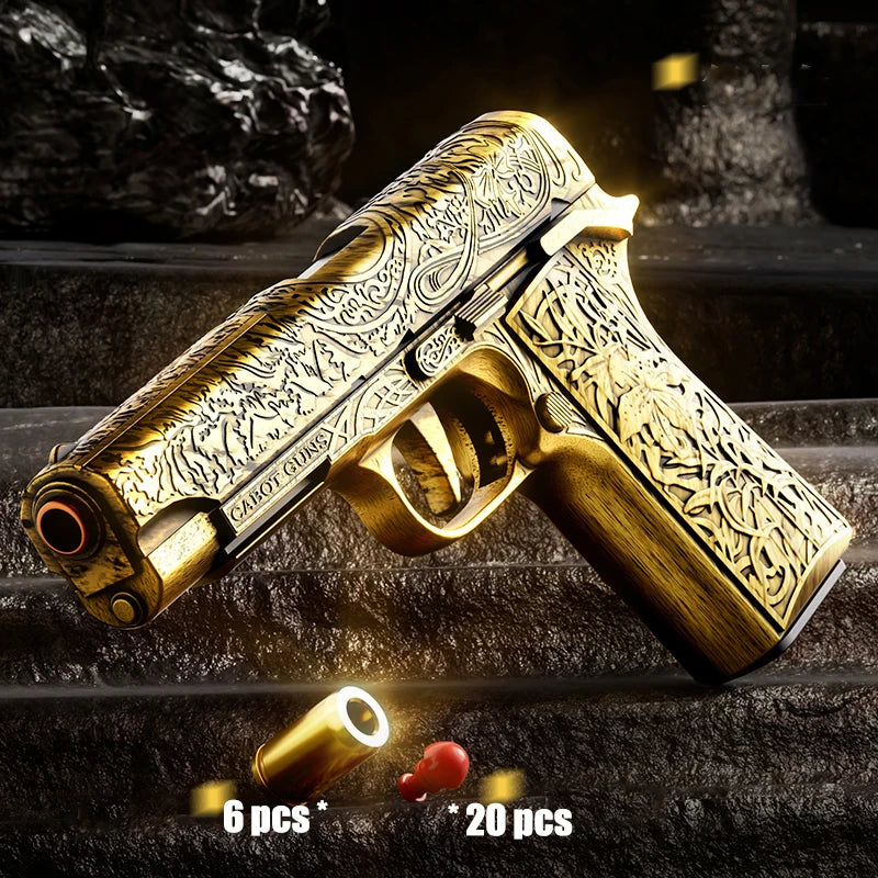 Decorative gold gun on a dark stone surface with bullets.