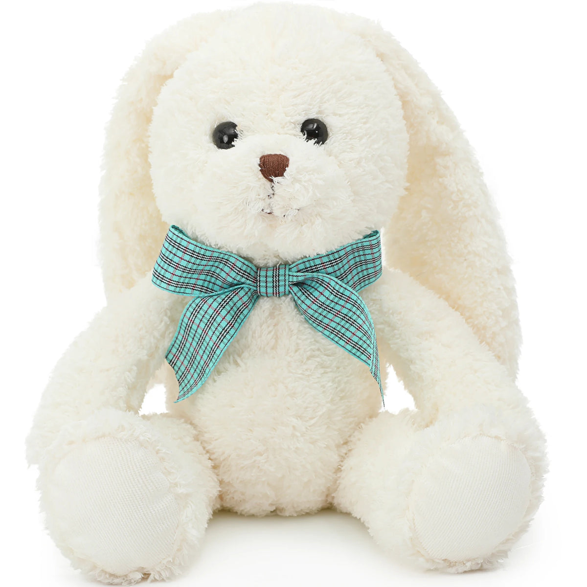 White teddy bear with a blue bow tie on a white background