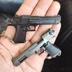 Metal 1:4 scale Desert Eagle style model keychain made of alloy, decorative collectible shown in hand