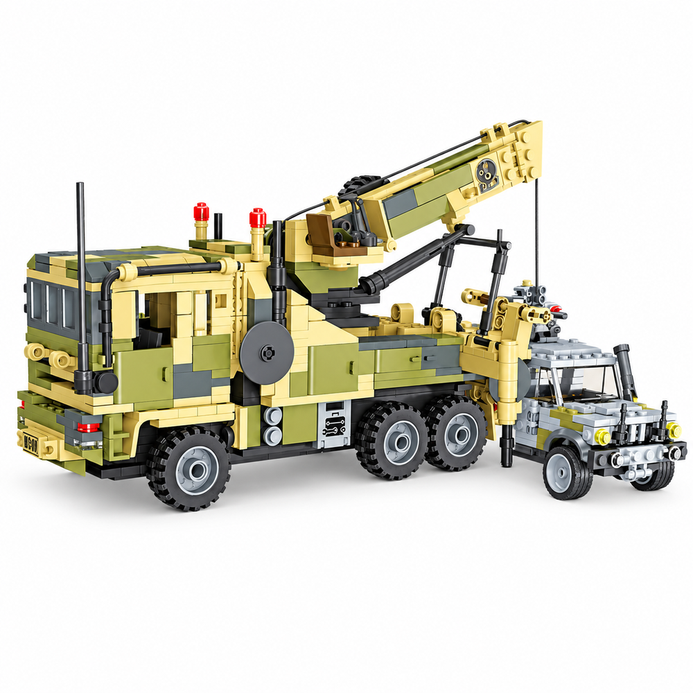 Tan and olive military building-block crane truck with raised boom and gray escort vehicle, front three-quarter view.