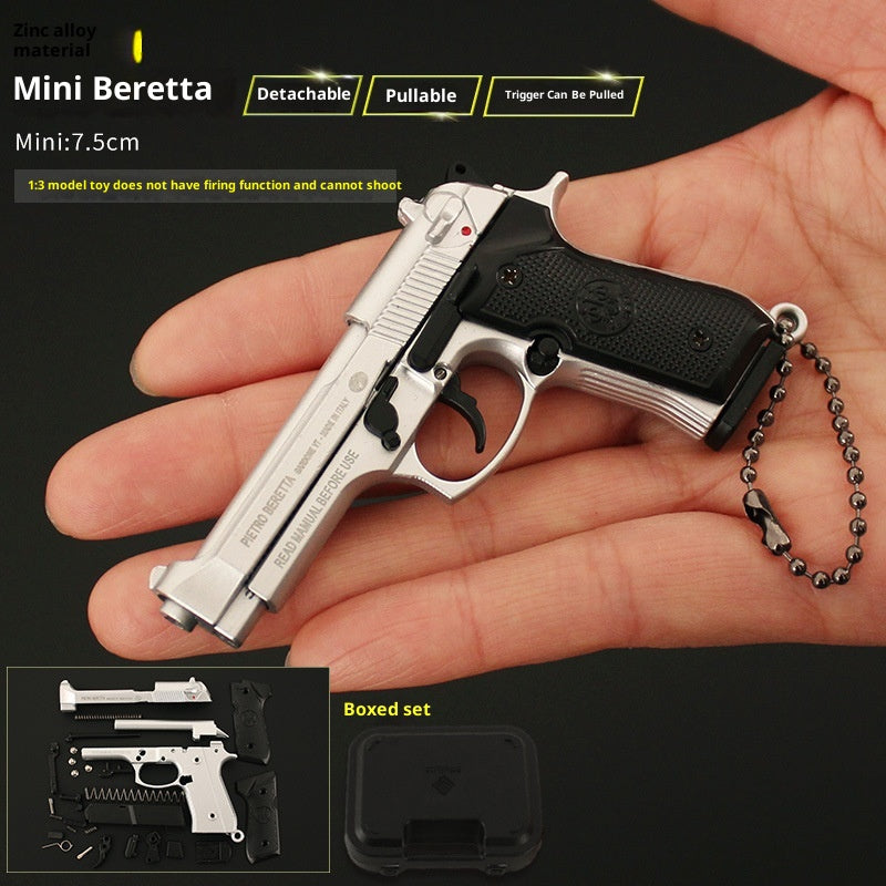 Detailed miniature alloy Beretta model displayed as a collector's figurine for men.