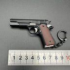 Handgun with brown grip and black metal parts on a gray background, next to a ruler for scale.