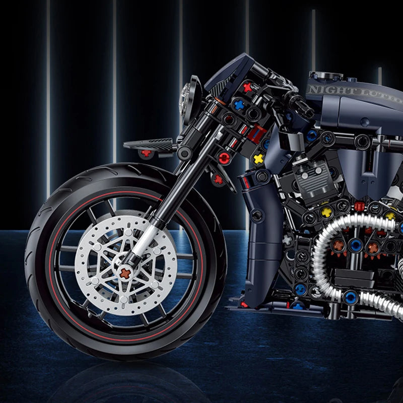 Detailed model motorcycle with intricate design on a dark background