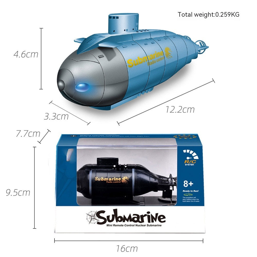 Toy submarine with packaging, showing dimensions and brand name.