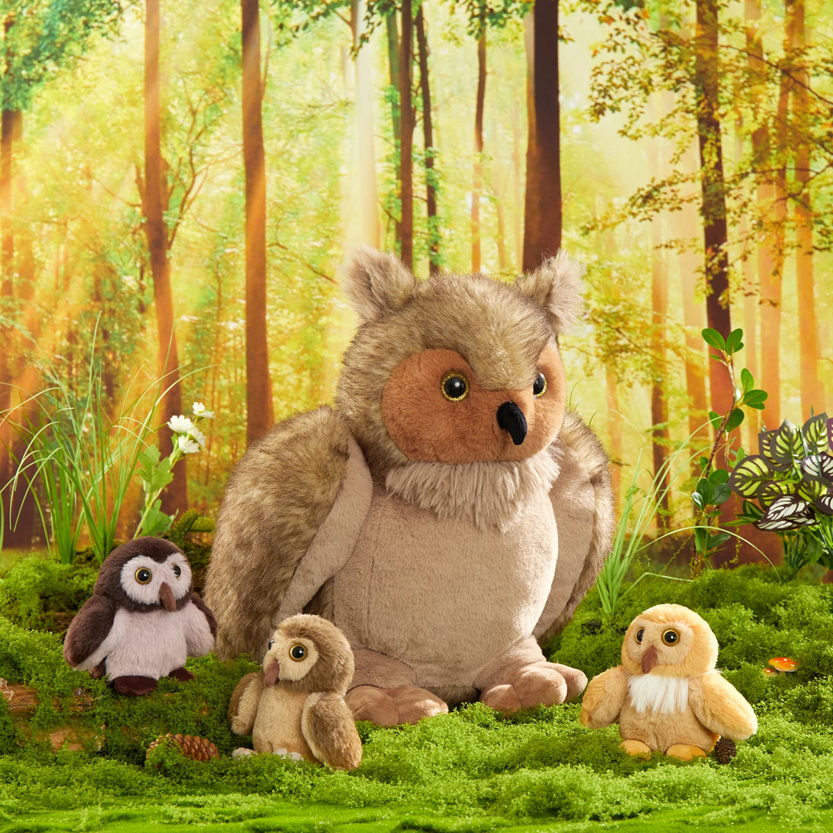 Plush owl and bird toys in a forest setting