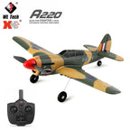 Model of a vintage fighter plane with a remote control on a white background, featuring WL Tech and XK logos.
