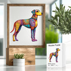 Colorful dog illustration in a wooden frame with a plant and wooden puzzle box in the background.
