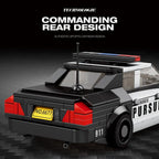 Toy police car model with 'Pursuit' branding on a dark background