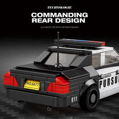 Toy police car model with 'Pursuit' branding on a dark background
