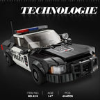 Toy police car model with 'Technologie' branding on a dark background