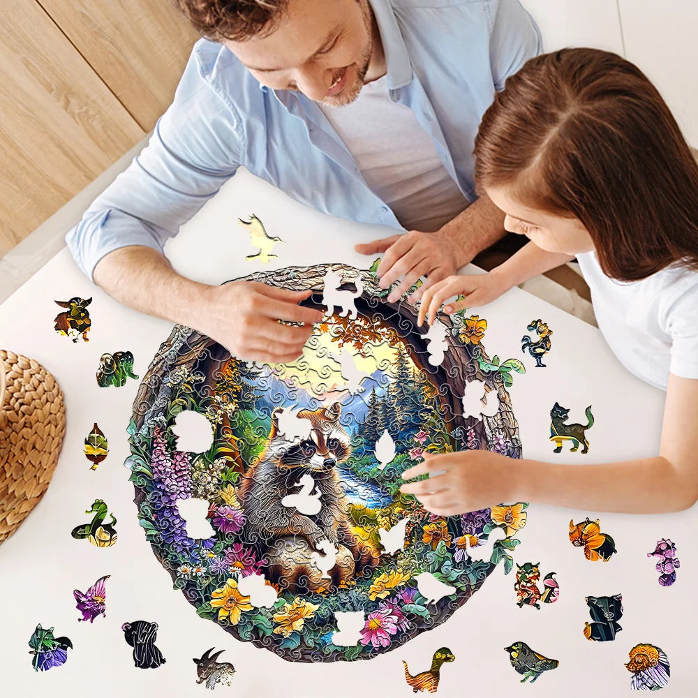 Man and young girl assembling a puzzle with animal illustrations on a table.